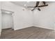 Bright bedroom with hardwood floors and plenty of natural light, creating a serene and comfortable atmosphere at 2426 Abbey Ave, Orlando, FL 32833