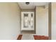 Elegant front door with decorative glass panels, creating an inviting entrance to the home at 2426 Abbey Ave, Orlando, FL 32833