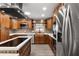 Beautiful kitchen with modern appliances, custom cabinetry, and a center island, ideal for meal preparation at 2426 Abbey Ave, Orlando, FL 32833