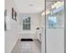 Bright bathroom featuring a separate glass shower and tub, and tile flooring at 2609 Dinville St, Kissimmee, FL 34747