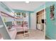 Bunk bedroom with pink accents, closet with shelving, flatscreen TV, and lots of space for ' toys at 2609 Dinville St, Kissimmee, FL 34747