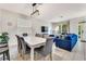 Open concept home, featuring a dining room with seating for eight and a view of the living room at 2609 Dinville St, Kissimmee, FL 34747