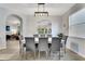 A combined dining/living room space with an eight-seat dining table and comfortable living room seating at 2609 Dinville St, Kissimmee, FL 34747