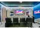 Incredible game room featuring surround sound, theater seating, a large flat screen TV, and custom lighting at 2609 Dinville St, Kissimmee, FL 34747