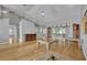 Spacious living room with hardwood floors, high ceilings, and sliding glass doors at 288 Englenook Dr, Debary, FL 32713