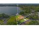 Lakefront property aerial highlighting property lines, private dock, and views at 3108 Troy Dr, Orlando, FL 32806