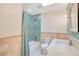 Bathroom with a tiled shower and a vanity with a sink and cabinet storage at 3108 Troy Dr, Orlando, FL 32806