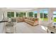 Bright room with large windows offering outdoor views, neutral color scheme, and tile floors at 3108 Troy Dr, Orlando, FL 32806