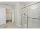 Bright bathroom with a modern shower and a view to the walk in closet at 3443 Berkshire Woods Ter, Deltona, FL 32725