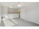 A spacious bedroom featuring neutral walls, plush carpeting, and an adjacent room at 3443 Berkshire Woods Ter, Deltona, FL 32725