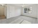 Bright bedroom featuring neutral walls, plush carpeting, and a window allowing natural light at 3443 Berkshire Woods Ter, Deltona, FL 32725