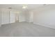 Spacious bedroom with a ceiling fan and neutral carpeting at 3443 Berkshire Woods Ter, Deltona, FL 32725