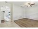 Bright living room featuring new floors and natural light at 3443 Berkshire Woods Ter, Deltona, FL 32725