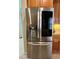 Stainless steel refrigerator with beverage dispenser and see-through glass door at 3579 Maple Ridge Loop, Kissimmee, FL 34741