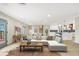 Open concept living area with a modern kitchen and comfortable seating at 40 W Laurel St, Apopka, FL 32703