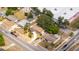 Aerial view of the home in a neighborhood with nearby commercial area at 4015 Kirkland Blvd, Orlando, FL 32811