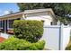 Backyard of a charming home featuring a privacy fence and well-maintained bushes at 4015 Kirkland Blvd, Orlando, FL 32811