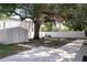 Expansive backyard with patio, storage shed, mature tree and dog house at 4015 Kirkland Blvd, Orlando, FL 32811