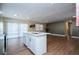 Bright kitchen with a center island, modern fixtures, and lots of natural light at 4015 Kirkland Blvd, Orlando, FL 32811