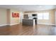 Living room featuring an island, new appliances, lots of natural light and hardwood floors at 4015 Kirkland Blvd, Orlando, FL 32811