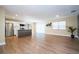 Living room featuring an island, new appliances, lots of natural light and hardwood floors at 4015 Kirkland Blvd, Orlando, FL 32811