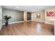 Open living area showcasing wood-look floors, neutral walls, and a bright, welcoming atmosphere at 4015 Kirkland Blvd, Orlando, FL 32811