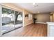 Bright living space with a large sliding glass door providing ample natural light and a view of the backyard at 4015 Kirkland Blvd, Orlando, FL 32811