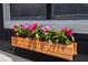 Close up of window box showing colorful flowers on the front of the house at 4015 Kirkland Blvd, Orlando, FL 32811