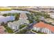 Aerial view of condo community with a lakeside location and resort-style amenities at 4024 Breakview Dr # 40604, Orlando, FL 32819