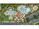 Aerial view of the resort-style pool, seating area and lush landscaping at 4024 Breakview Dr # 40604, Orlando, FL 32819
