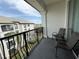 Relaxing balcony area with comfortable chairs and pleasant community views at 4024 Breakview Dr # 40604, Orlando, FL 32819