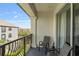 Balcony with two chairs and a table at 4024 Breakview Dr # 40604, Orlando, FL 32819