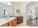 Bright bathroom with a view into the bedroom area at 4024 Breakview Dr # 40604, Orlando, FL 32819