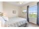 Bedroom with hardwood floors, a TV, ceiling fan and a view at 4024 Breakview Dr # 40604, Orlando, FL 32819