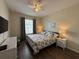 Comfortable bedroom featuring neutral paint and dark floors at 4024 Breakview Dr # 40604, Orlando, FL 32819