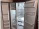 Spacious stainless steel refrigerator with adjustable shelves and door storage at 4024 Breakview Dr # 40604, Orlando, FL 32819