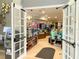 View of the retail store through double glass doors with merchandise on display at 4024 Breakview Dr # 40604, Orlando, FL 32819
