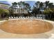 Interactive splash pad surrounded by lounge chairs, offering a fun and refreshing outdoor experience at 4024 Breakview Dr # 40604, Orlando, FL 32819