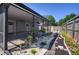 Covered patio area with screened in porch and garden at 4216 Cricket Hollow Cv, Casselberry, FL 32707