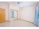 Bedroom featuring a mirrored closet and window with natural light at 4216 Cricket Hollow Cv, Casselberry, FL 32707