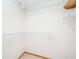 Walk-in closet with white wire shelving, providing ample storage space at 4216 Cricket Hollow Cv, Casselberry, FL 32707