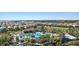 Aerial view of the community pool, playground, and clubhouse at 4405 Acorn Ct, Davenport, FL 33837