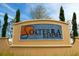 Community sign with the name Solterra Resort and beautiful landscaping at 4405 Acorn Ct, Davenport, FL 33837