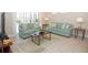 Relaxing living room featuring comfortable seating and sliding glass doors leading to the patio at 4405 Acorn Ct, Davenport, FL 33837