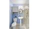 Bathroom featuring pedestal sink, glass shower, and blue walls at 4700 Larado Pl, Orlando, FL 32812