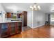 Modern kitchen with quartz countertops, stainless steel appliances, and stylish wooden cabinetry at 4700 Larado Pl, Orlando, FL 32812