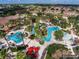 Stunning aerial view of the Regal Palms resort with multiple pools and lush landscaping at 626 Verona Ave, Davenport, FL 33897