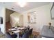 Bright dining space with marble table, adjacent to the kitchen, offering convenience and style at 626 Verona Ave, Davenport, FL 33897