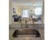 Open-concept kitchen featuring a view of the dining and living areas at 626 Verona Ave, Davenport, FL 33897