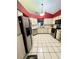 Functional kitchen with stainless steel appliances, white cabinets, and ample counter space for cooking at 6518 Garden Spring Ct, Orlando, FL 32818